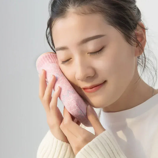 Compact Hand Warmer Bottle with Knitted Sleeve