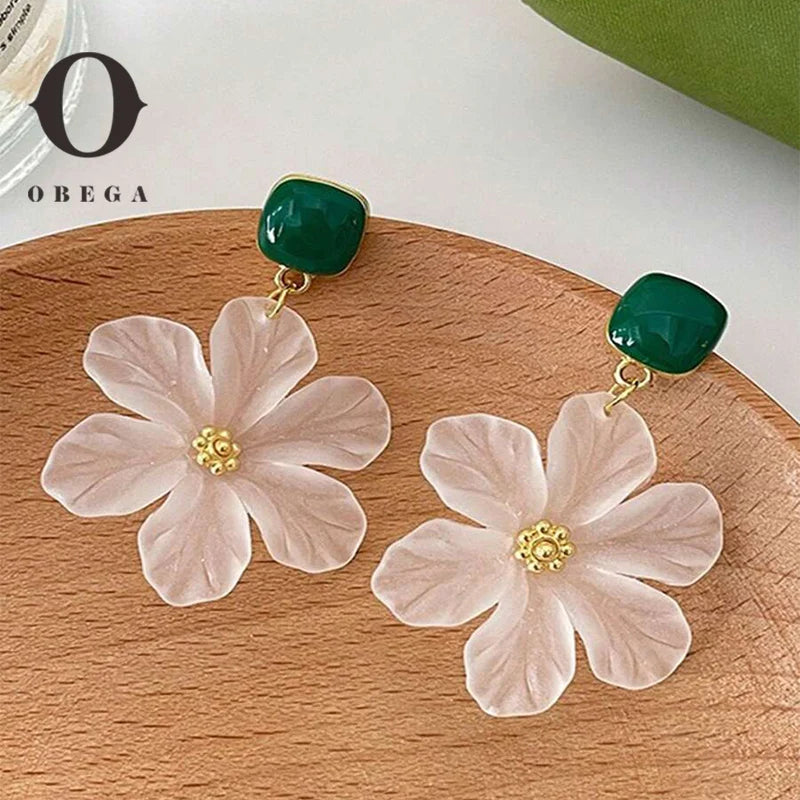 Obega White Flower Charm Square Metal Earrings