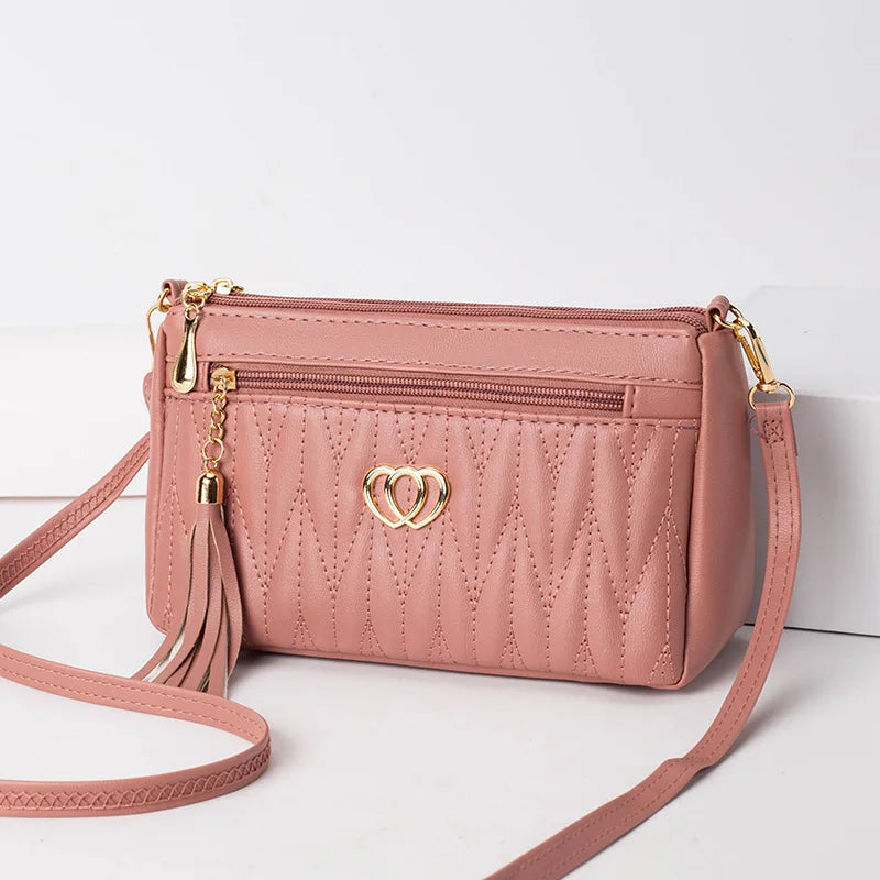 Quilted Handbag with Tassel & Phone Wallet Storage