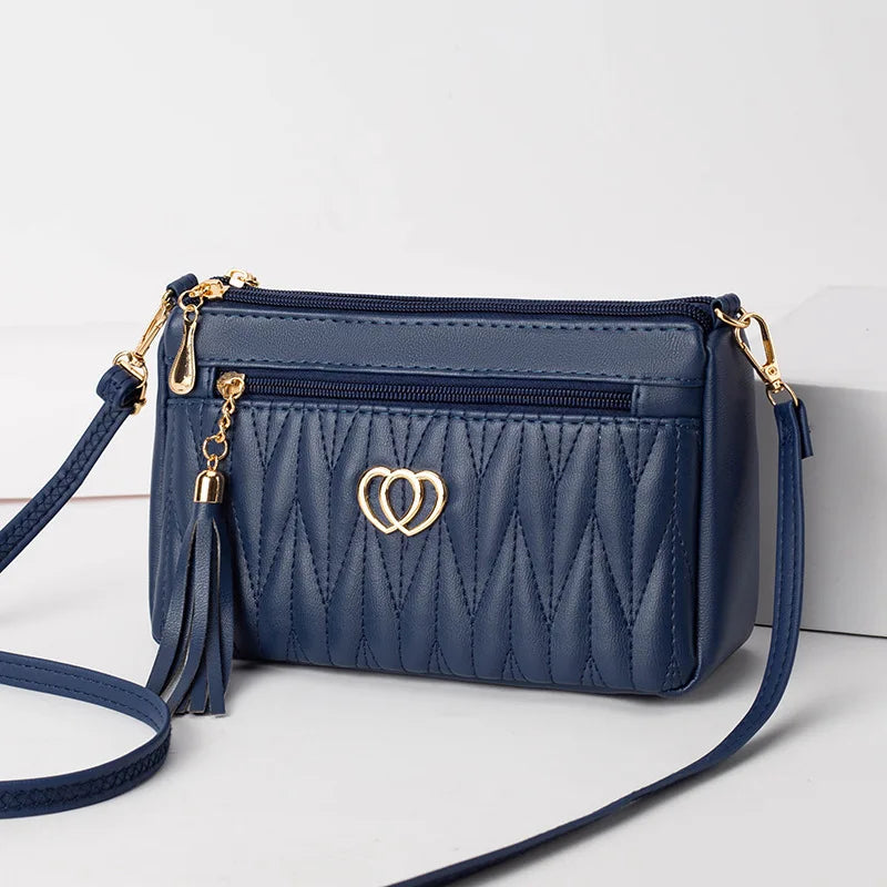 Quilted Handbag with Tassel & Phone Wallet Storage