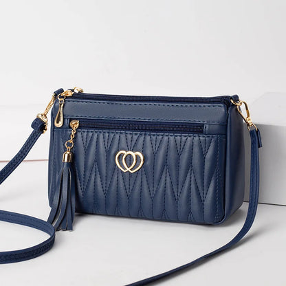 Quilted Handbag with Tassel & Phone Wallet Storage