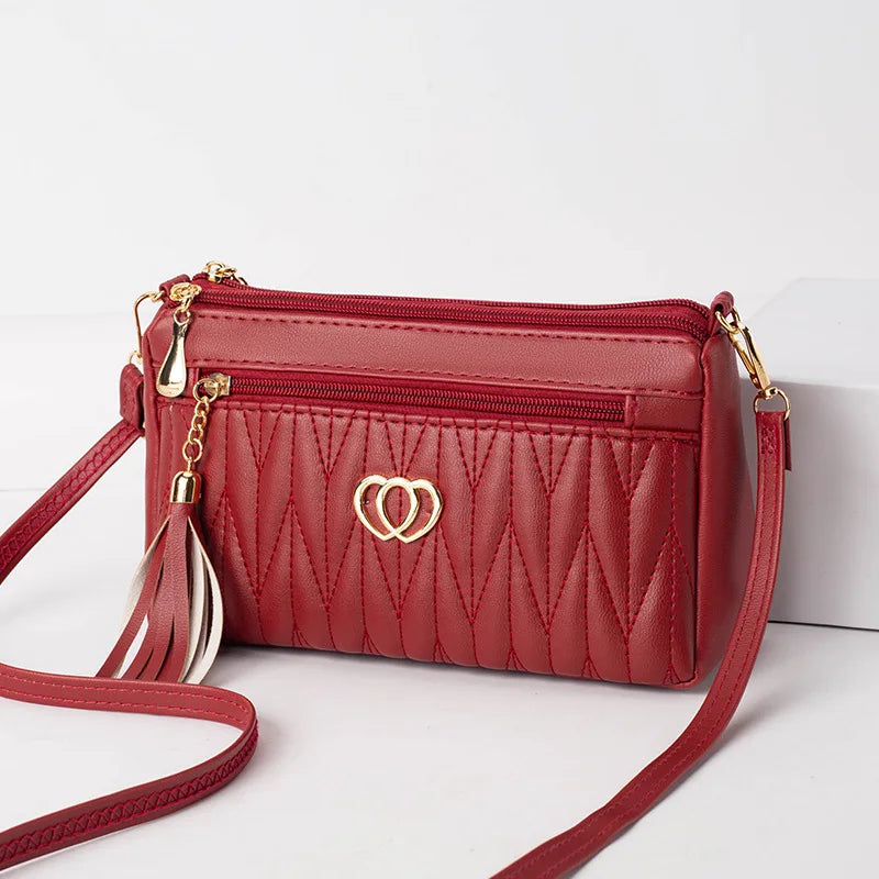 Quilted Handbag with Tassel & Phone Wallet Storage