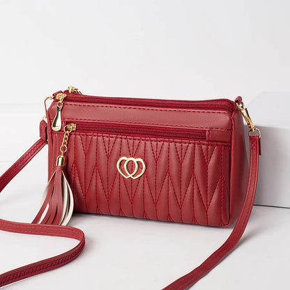 Quilted Handbag with Tassel & Phone Wallet Storage