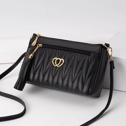 Quilted Handbag with Tassel & Phone Wallet Storage