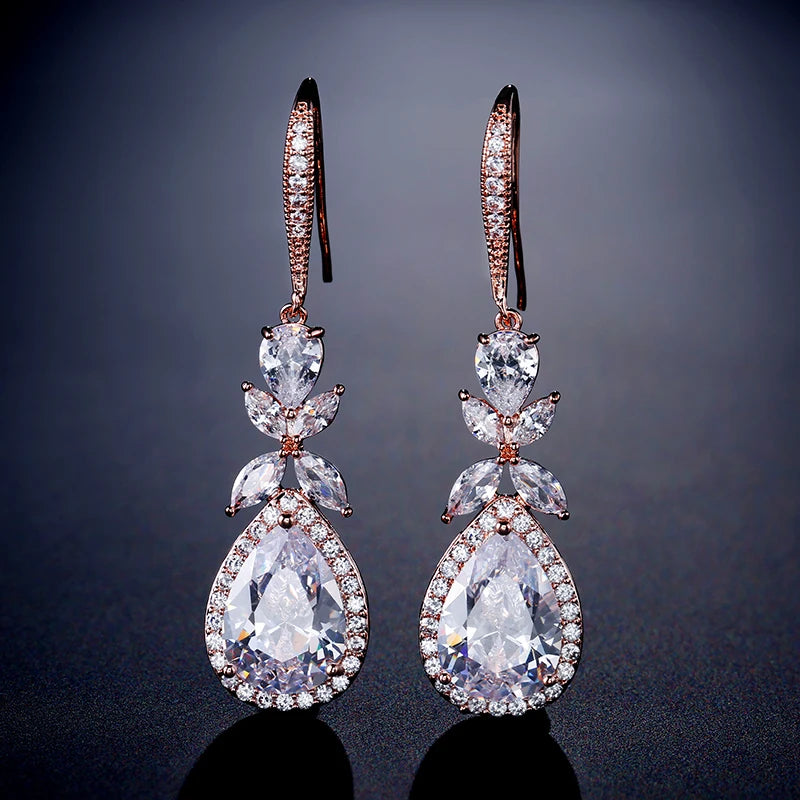 Zakol Elegant Shiny Cubic Zirconia Leaf Tassel Earrings