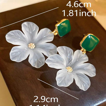 Obega White Flower Charm Square Metal Earrings