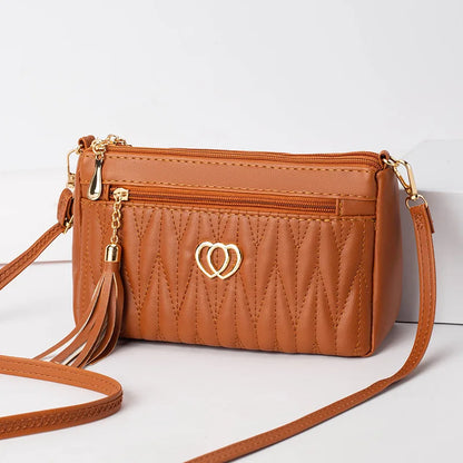 Quilted Handbag with Tassel & Phone Wallet Storage