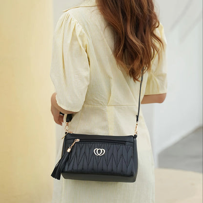 Quilted Handbag with Tassel & Phone Wallet Storage